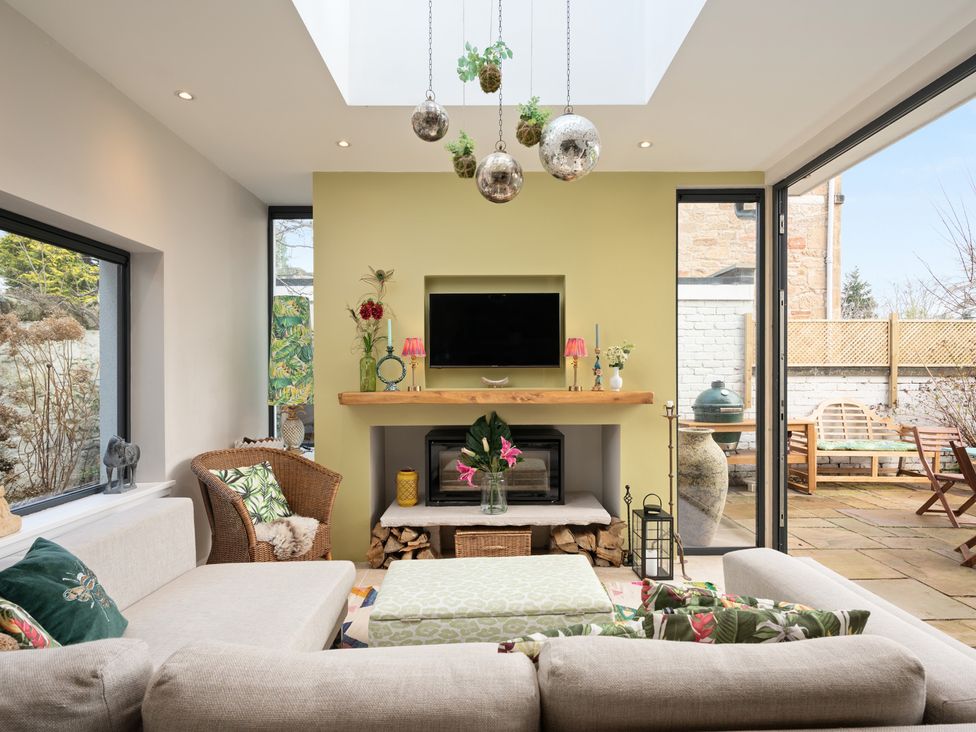 A living room with a sofa and coffee table at the property in the location