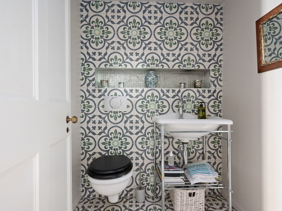 A bathroom with a toilet and sink at 