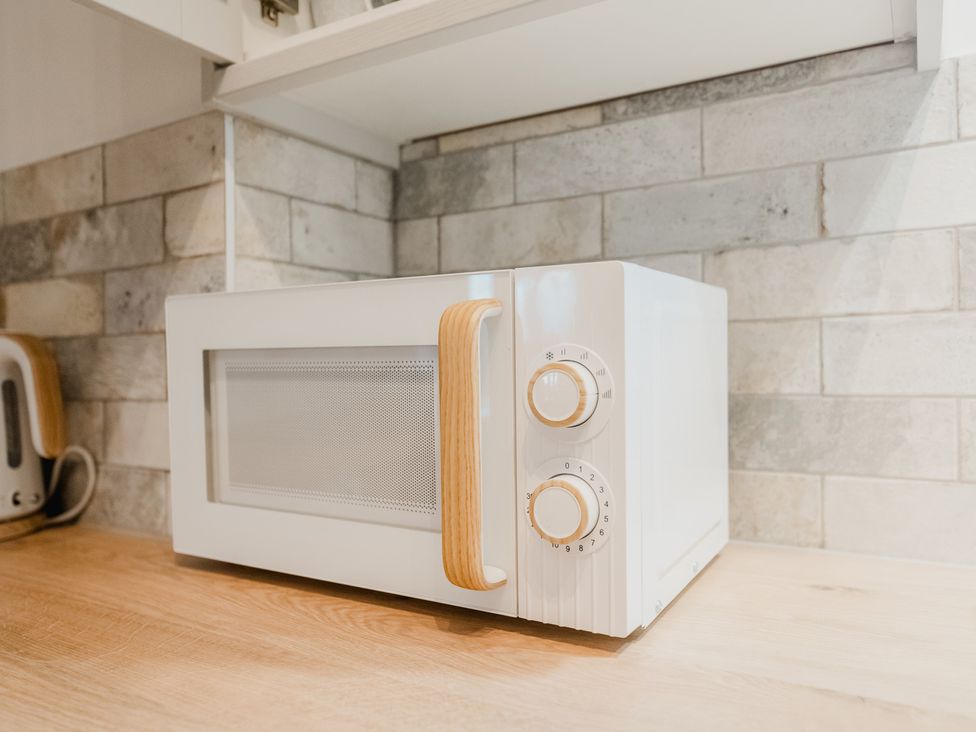 A microwave on a kitchen counter