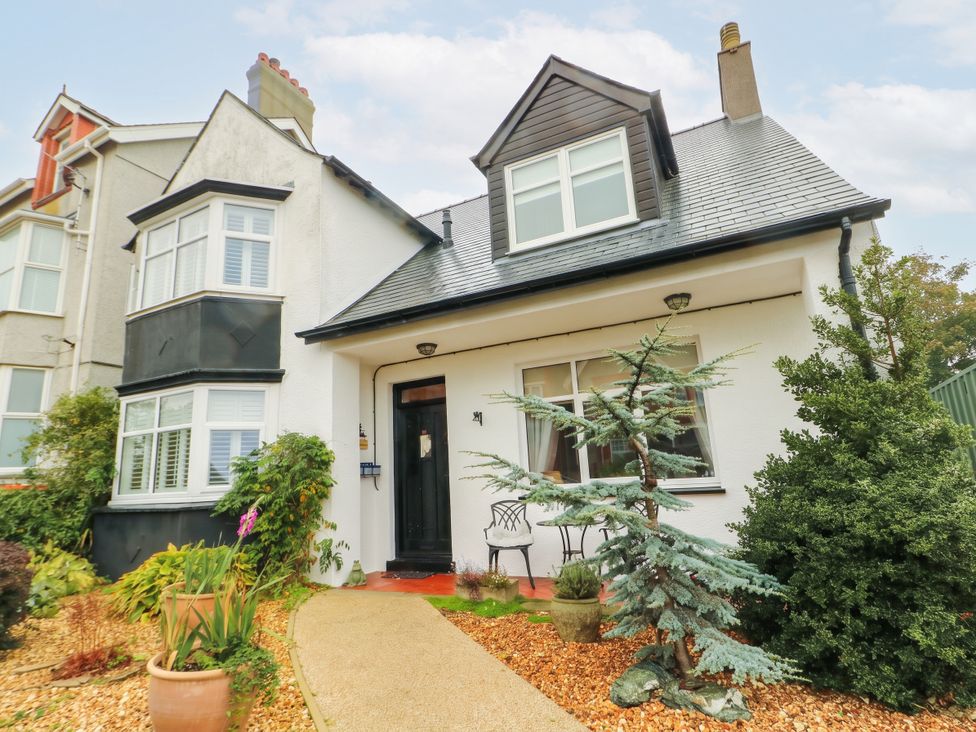 A house with a pathway and plants at 11 Bryn Goleu Avenue North Holyhead