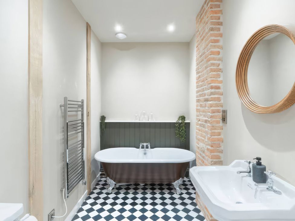 A bathroom with a bathtub and sink at Apt. 2 in York
