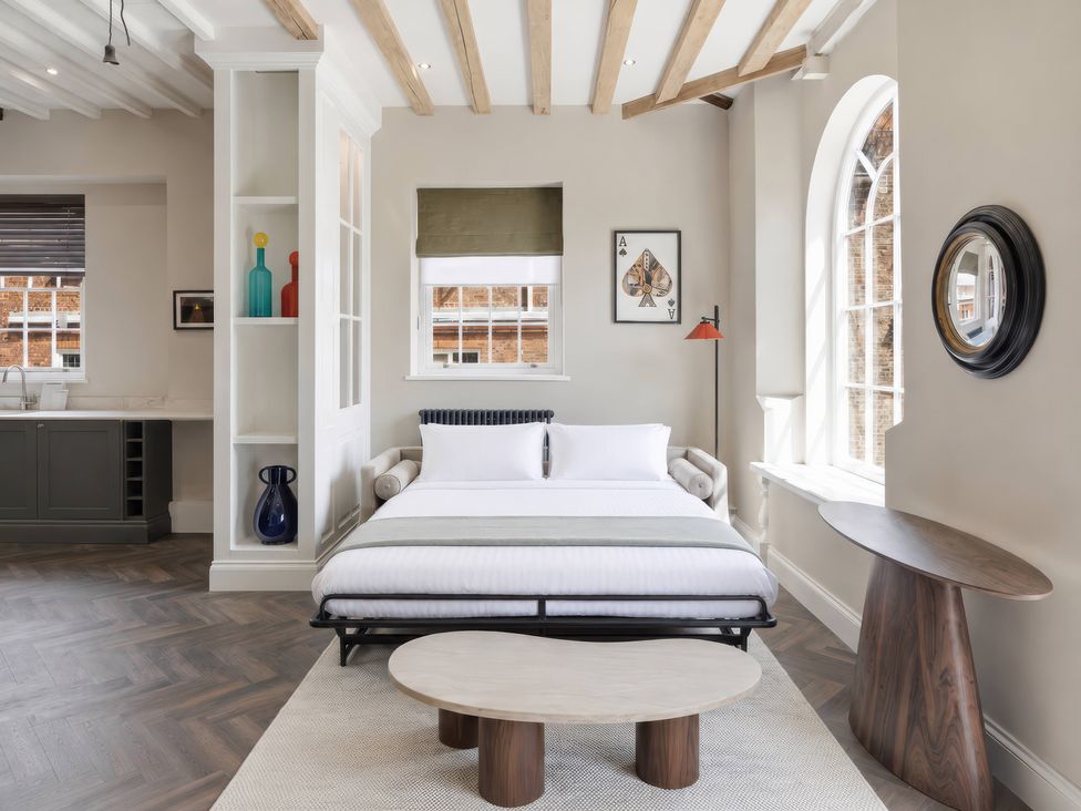 A bedroom with a bed and a nightstand at Apt. 3 in York