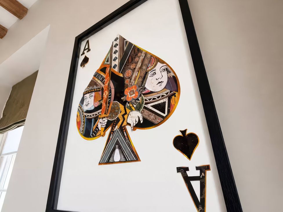 A framed ace of spades playing card design at Apt. 3 in York