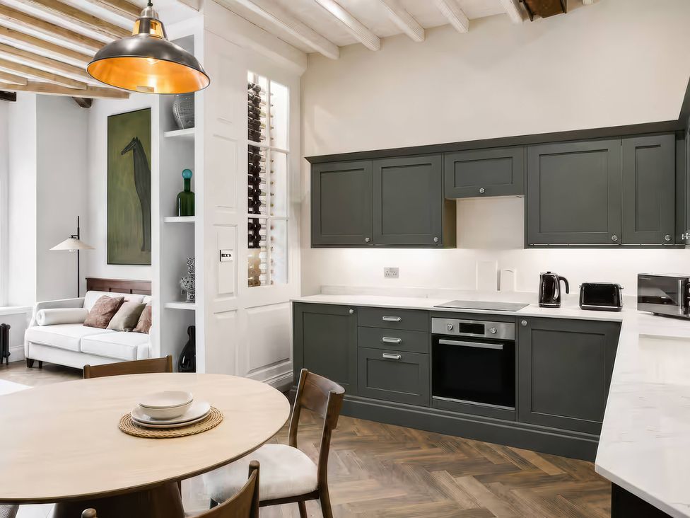 A kitchen with cabinets and appliances at Apt.4 in York