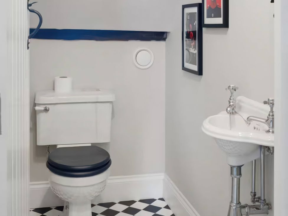 A bathroom with a toilet and sink at Apt.4 in York