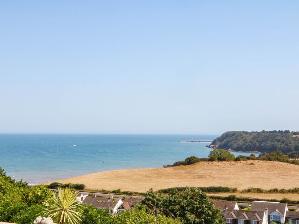 A view of a beach and ocean at Elberry Cove View in Paignton