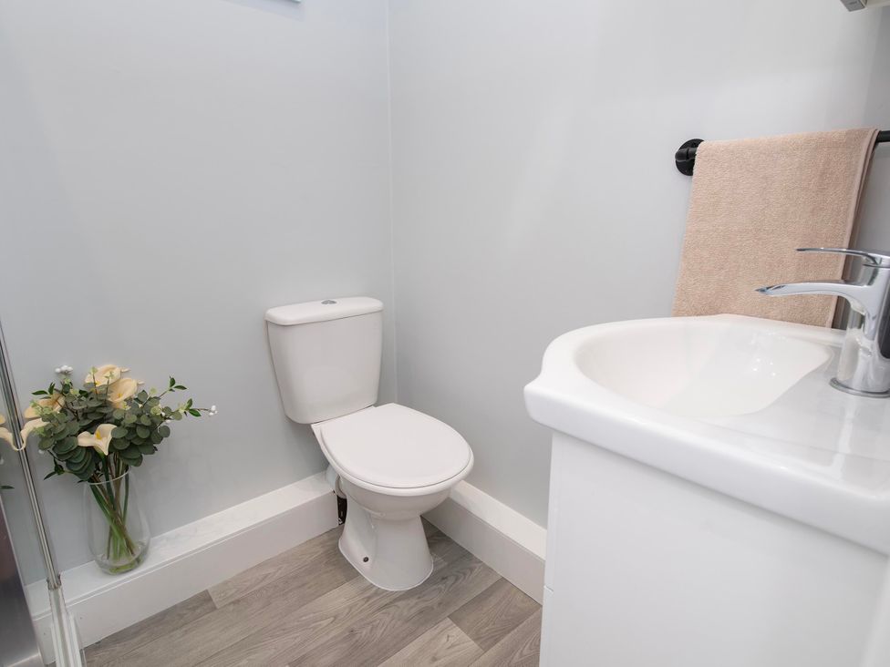 A bathroom with a toilet and sink at The Old School House 