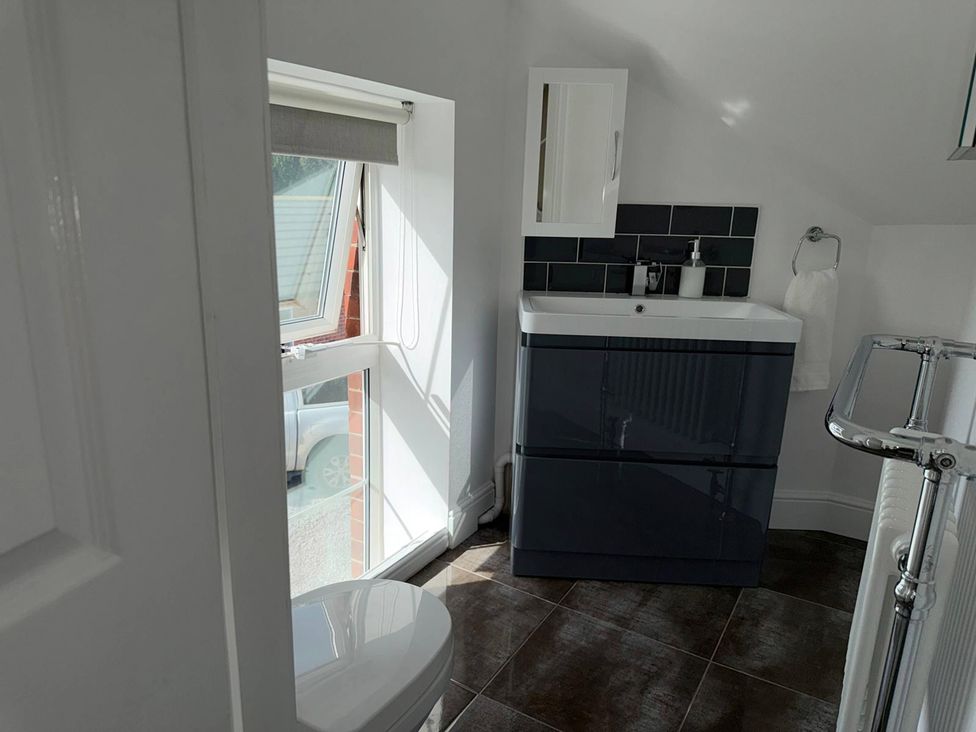 A bathroom with a sink and toilet at The Old School House in Langtoft