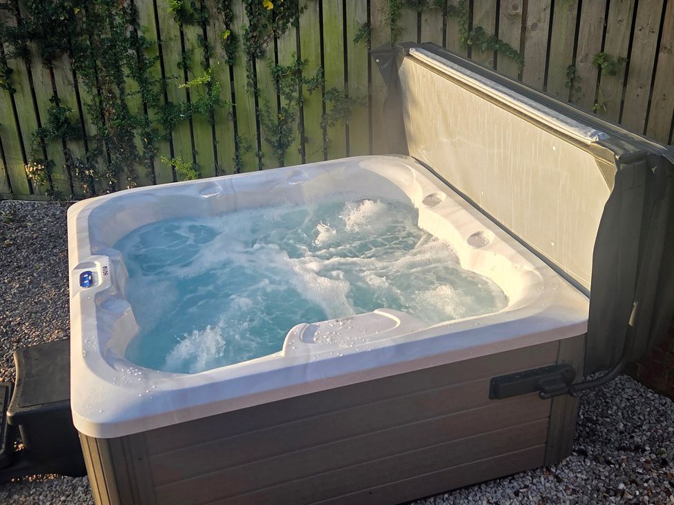 A hot tub with water at The Old School House in Langtoft