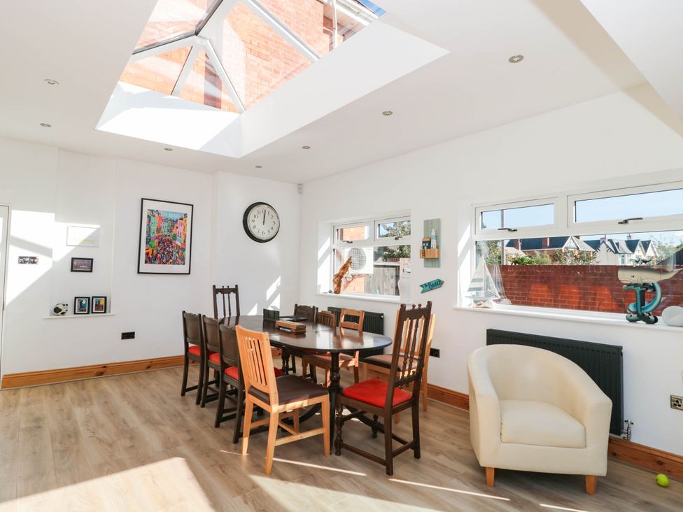 A dining room with a table and chairs at Ashbourne House 