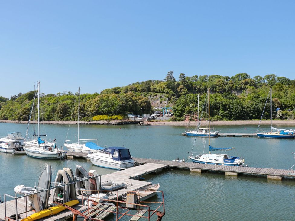 A marina with boats docked at Shipwrights in Brixham
