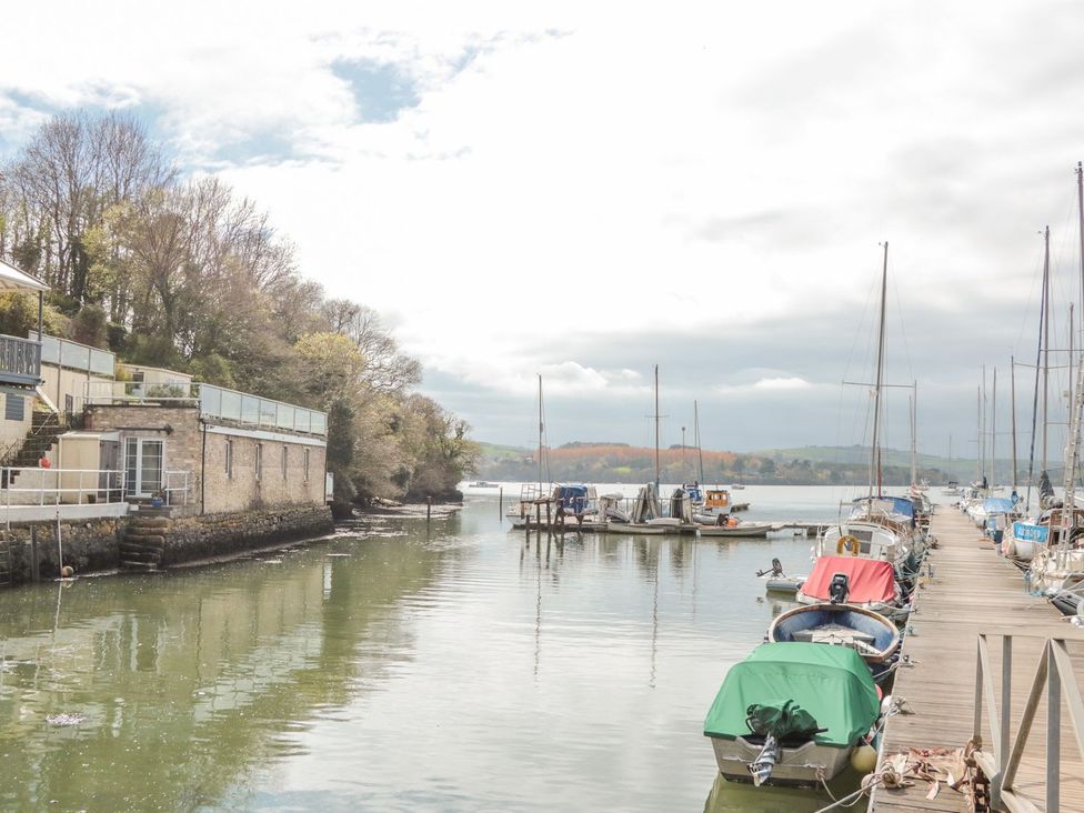 A dock with boats at the Spanish Boathouse in Brixham