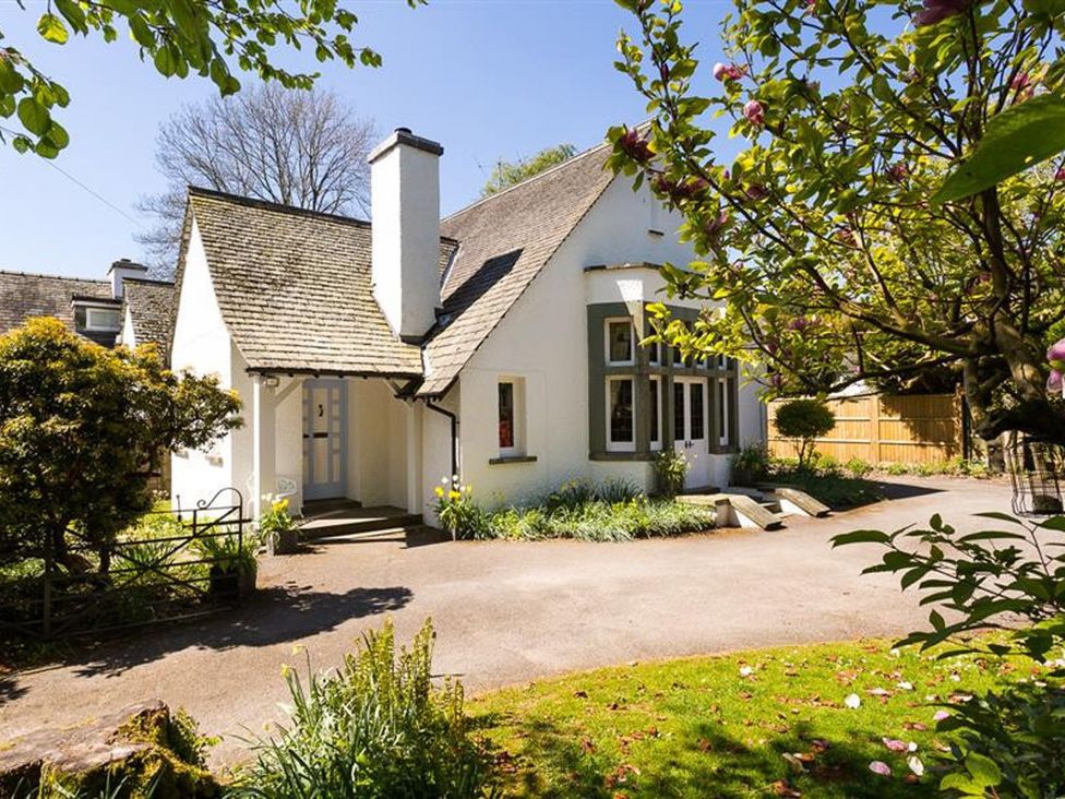 A house with garden and pathway at White Gables in Ambleside