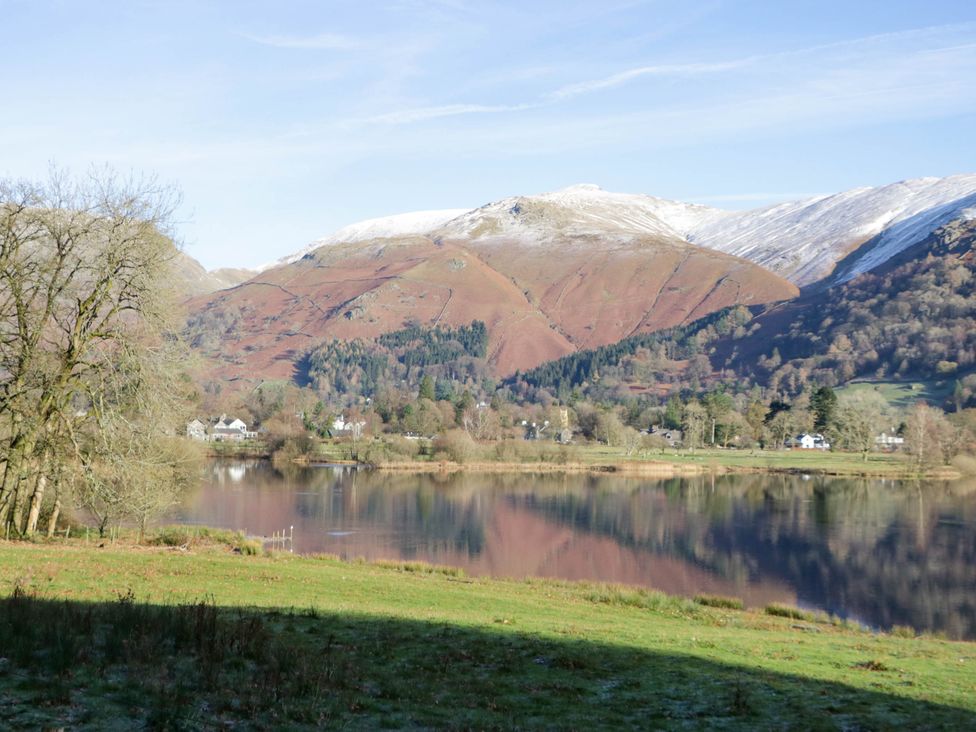 A scenic view of mountains and a lake at White Gables in Grasmere