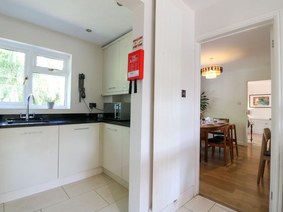 A kitchen with sink and cabinet at 7 Forge Close
