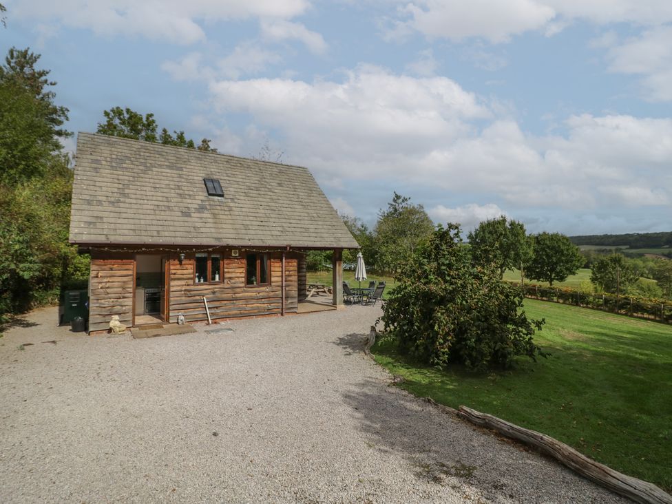 A house with a patio area and gravel driveway at Kingfisher in Worcester