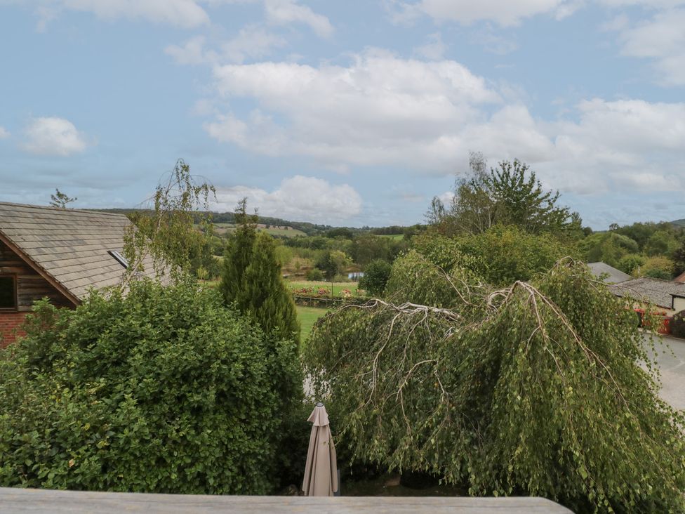 A view of houses and trees in a rural landscape at Heron in Worcester