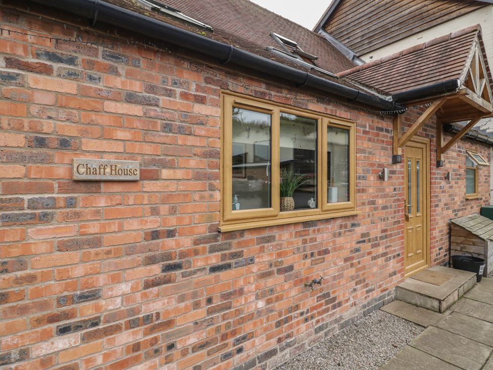 An exterior view of Chaff House with a door and window in Worcester