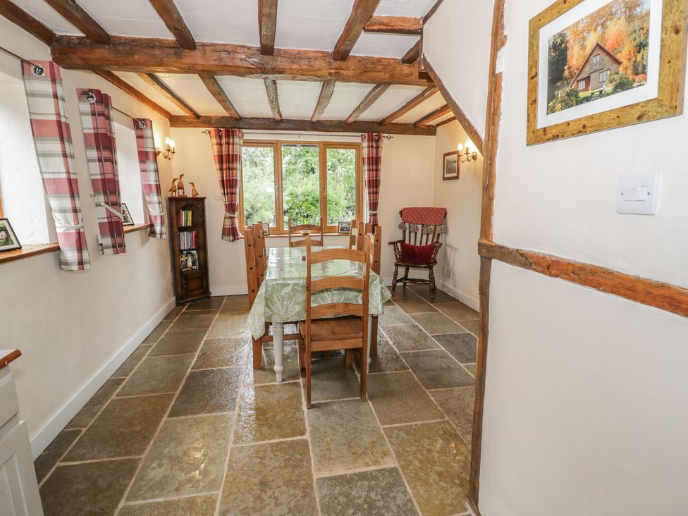 A dining room with a table and chairs at Chaff House in Worcester