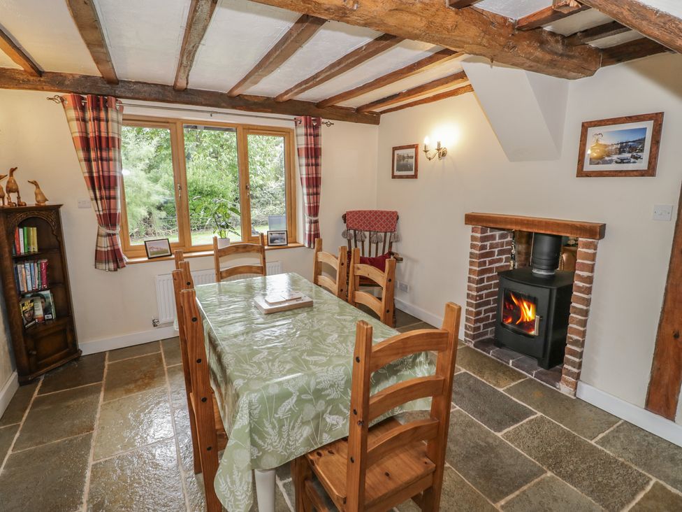 A dining room with a table and chairs at Chaff House in Worcester