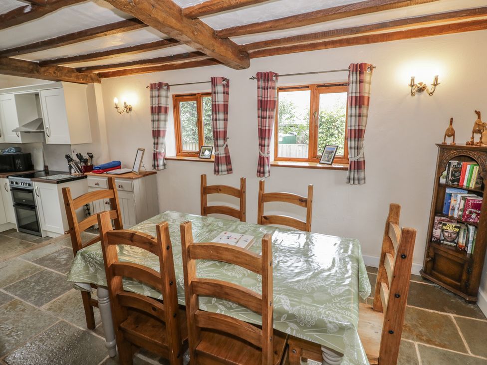A dining room with a table and chairs at Chaff House in Worcester