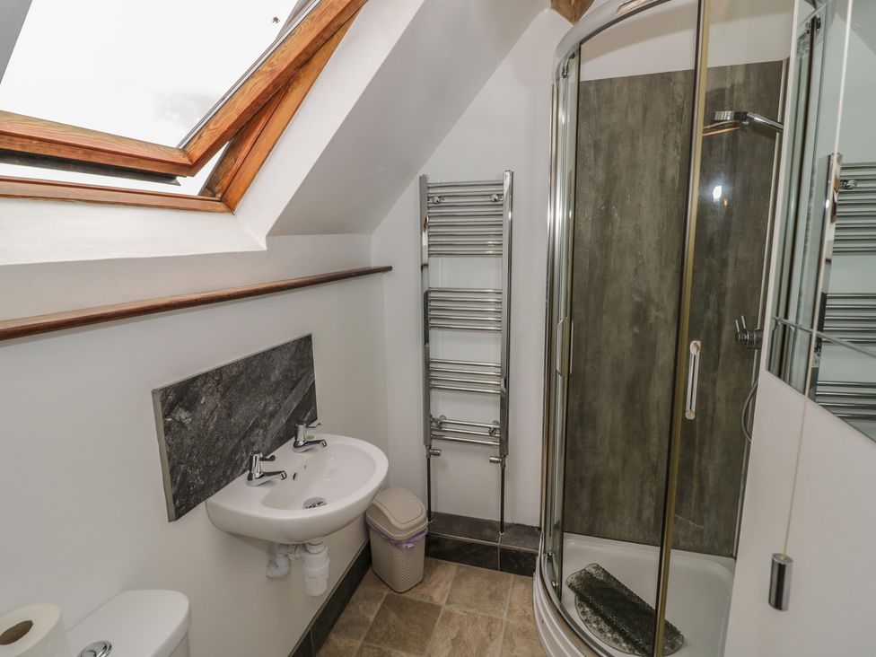 A bathroom with a sink and shower at Chaff House in Worcester