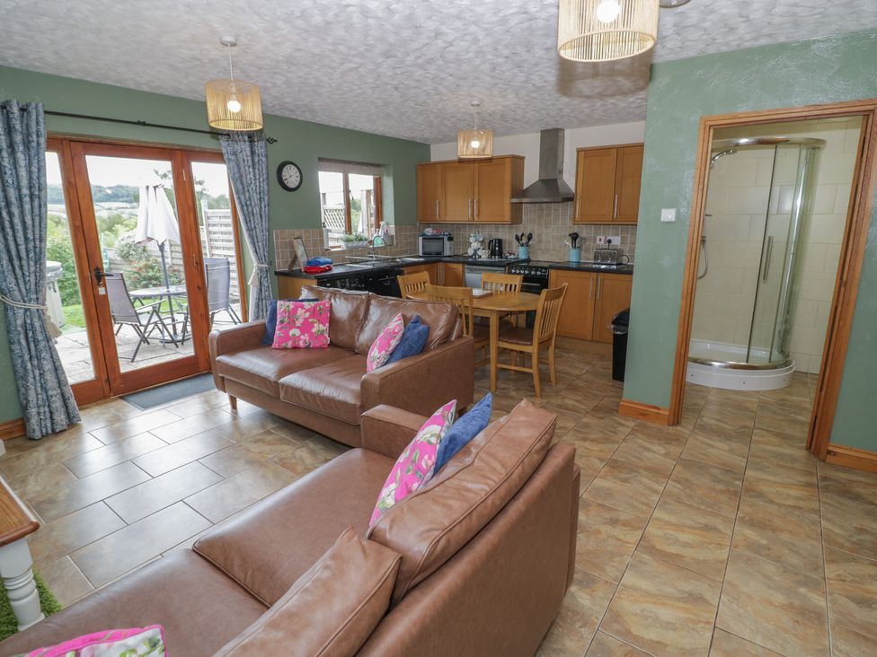 A kitchen with seating and appliances at Pippin in Worcester