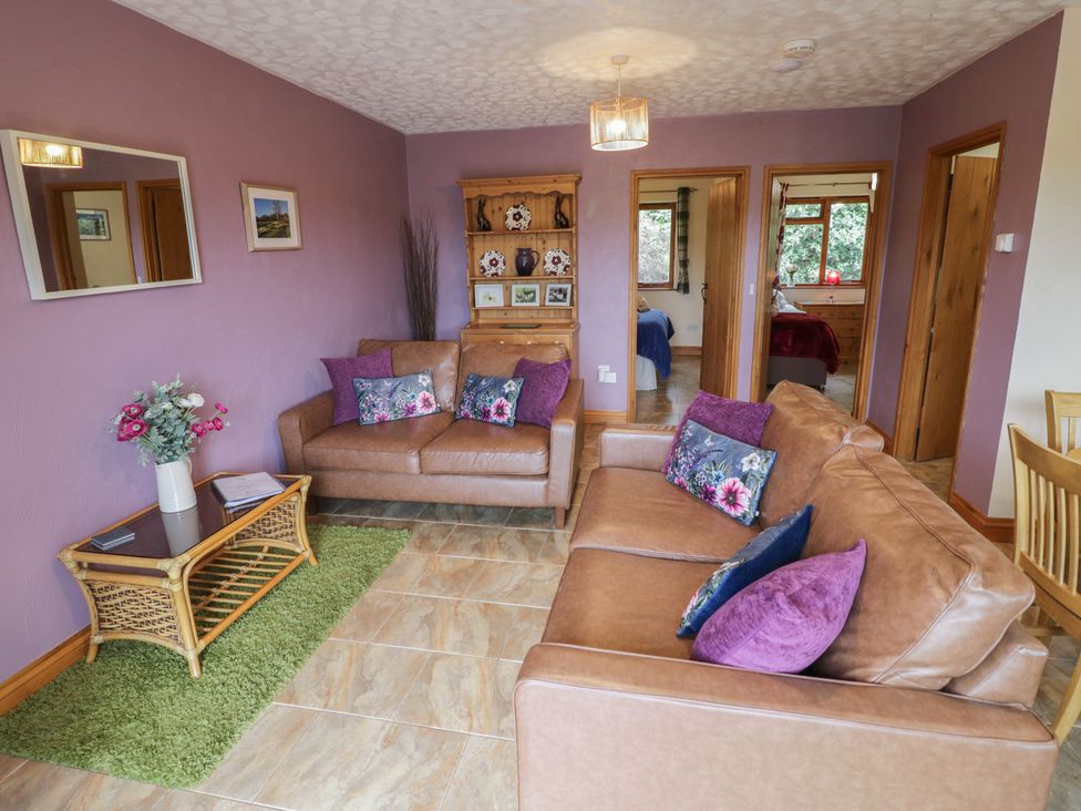 A living room with sofas and a coffee table at Russet in Worcester