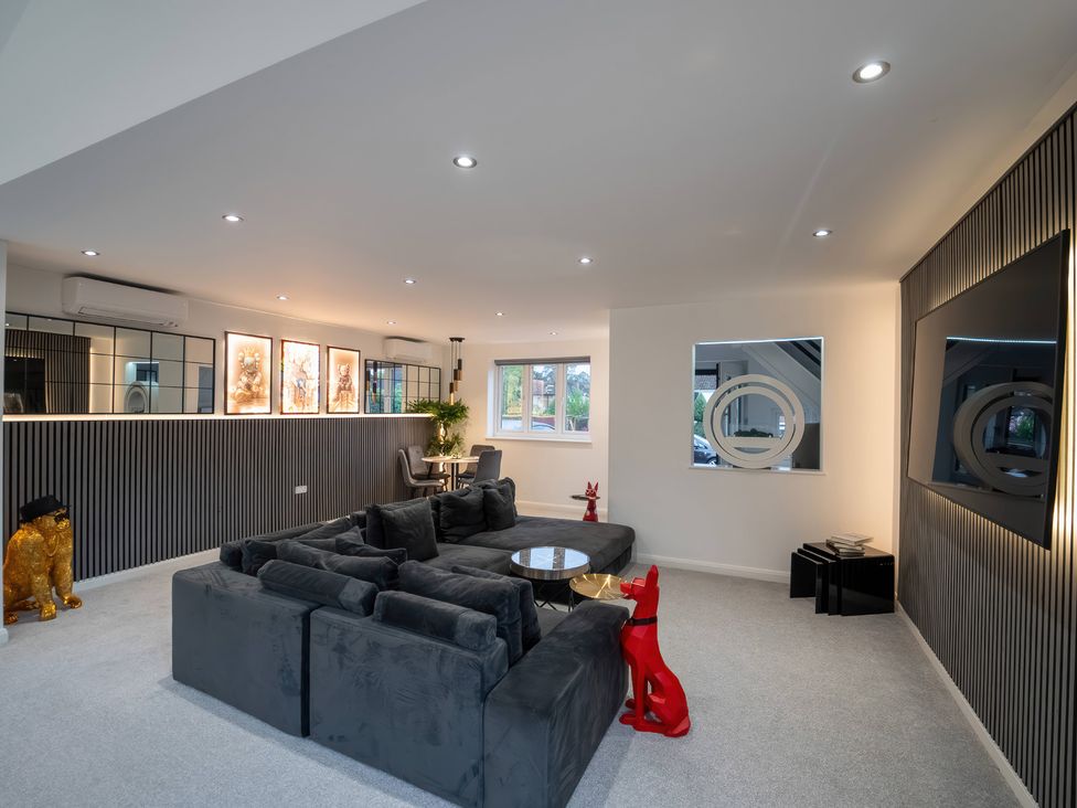 A living room with a sofa and coffee table at 29 Batchworth Lane Northwood, Hertfordshire