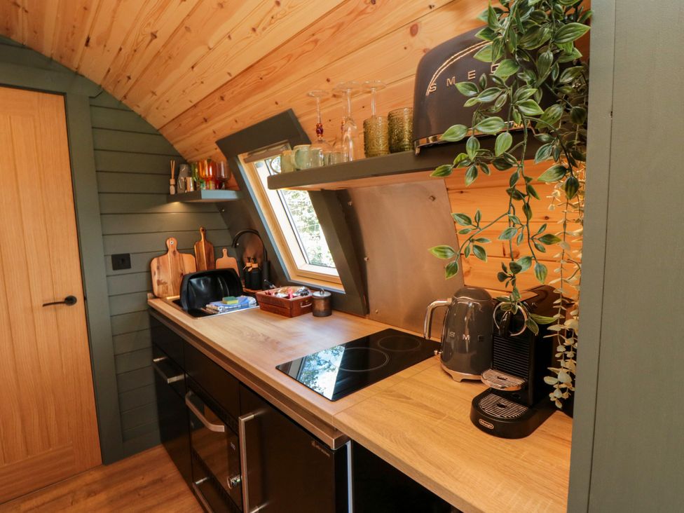 A kitchen with a countertop and appliances at Windy Ridge Lodge in Egton