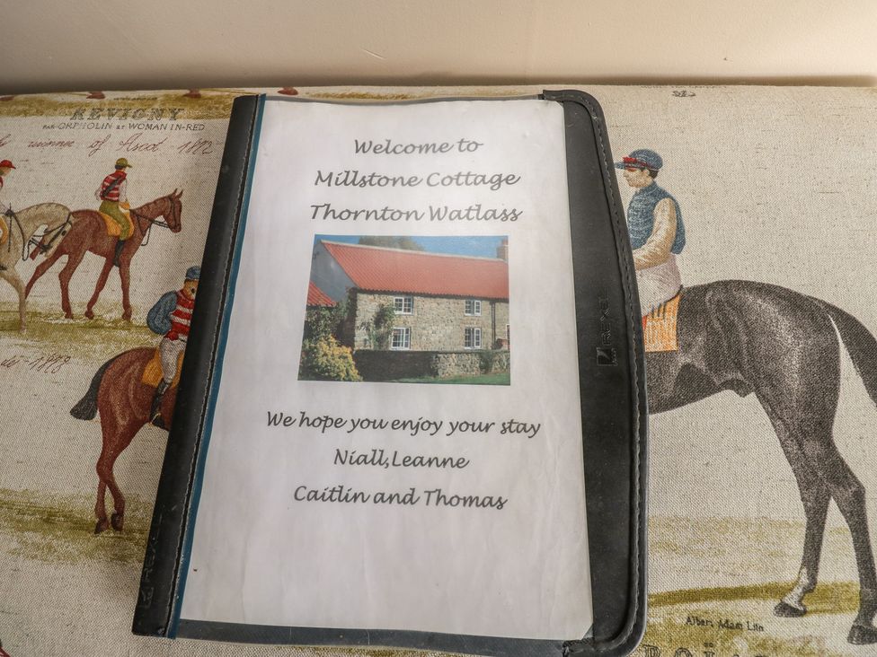 A welcome booklet on a table at Millstone Cottage in Ripon