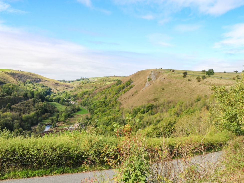 A landscape view of hills and a valley near 73 Ravensdale Cottages Cressbrook near Litton Derbyshire