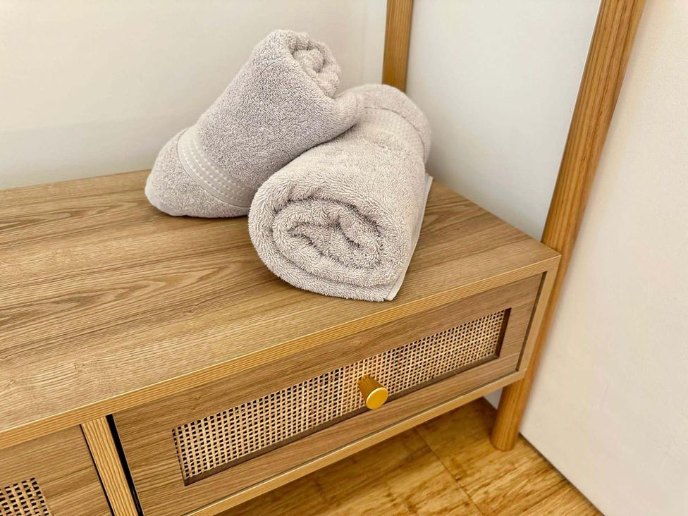 Towels on wooden furniture at Luxurious guest house in Yorkshire with parking, Hemingbrough, Yorkshire