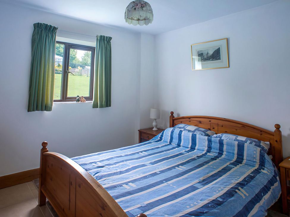 A bedroom with a bed and window at Accessible 4-Bed Barn, Sleeps 8 - Farm Stay The Games Barn near Mayfield