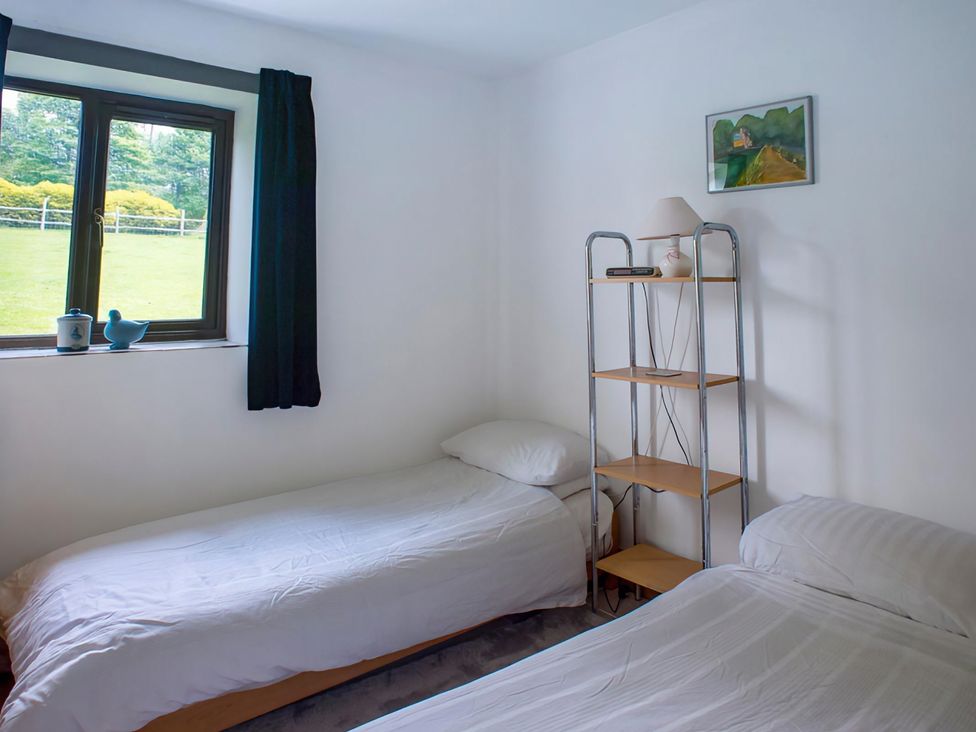 A bedroom with twin beds and a window at Accessible 4-Bed Barn, Sleeps 8 - Farm Stay near Mayfield