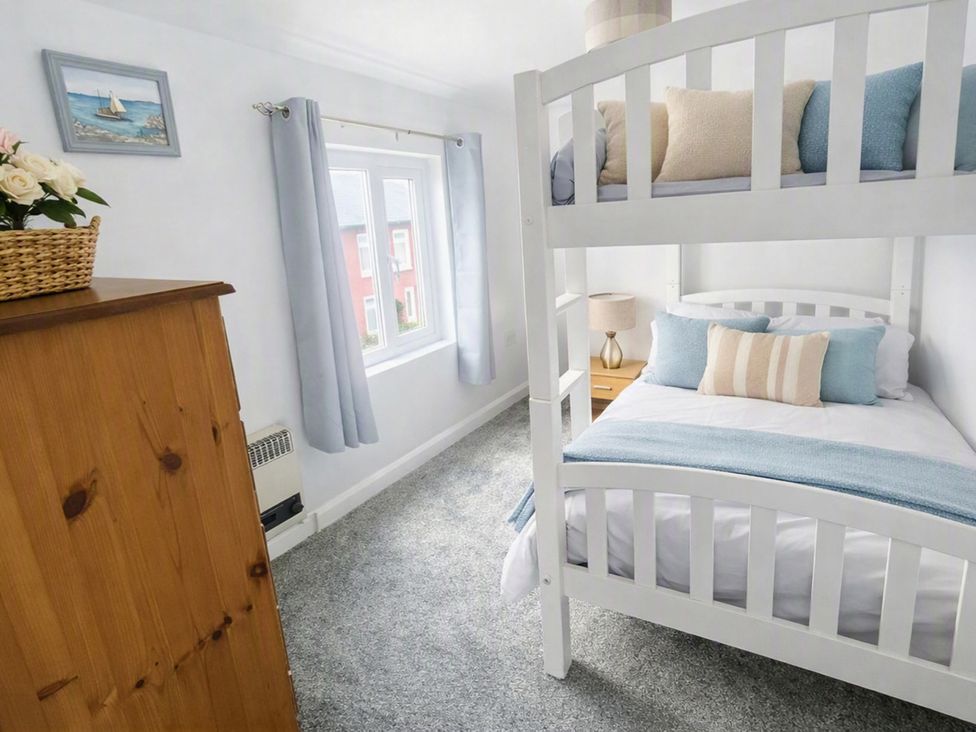 A bedroom with a bunk bed and a double bed at Stylish Cornish Retreat, Sleeps 4 Near Hayle Beach, Hayle
