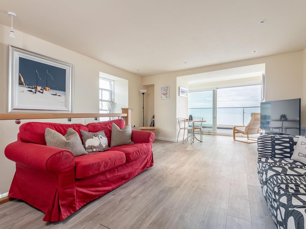 A living room with a sofa and television at Cellardyke 3-Bed House, Sleeps 6 with Sea Terrace in Cellardyke