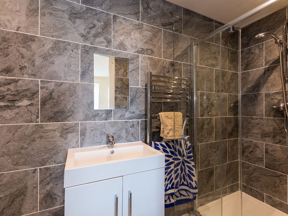 A bathroom with sink and shower at Cellardyke 3-Bed House, Sleeps 6 with Sea Terrace in Cellardyke