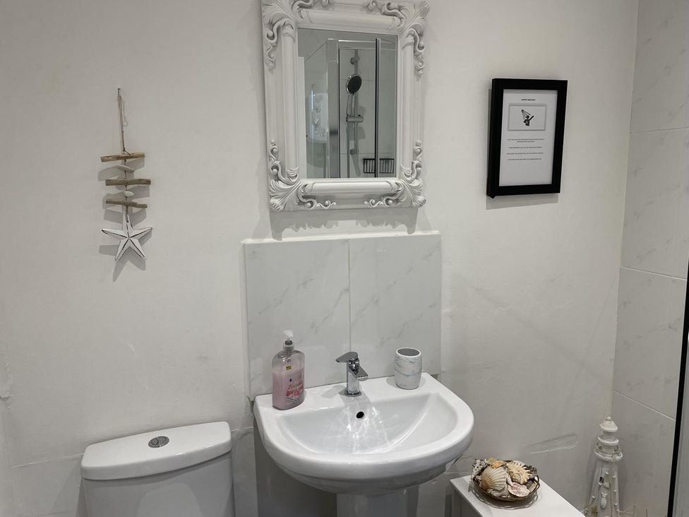 A bathroom with a sink and toilet at Rose Apartment 2-Bed Apt, Sleeps 4 Town Centre Ayr