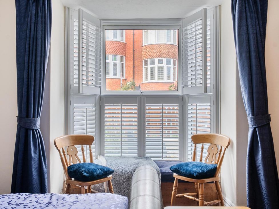 A living room with chairs and a window at 1 Bed - Sleeps 4 - Parking - Pets - Town Centre in Wadebridge