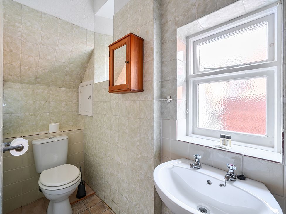 A bathroom with a sink and toilet at House in historic village - Sleeps 6, Dunster