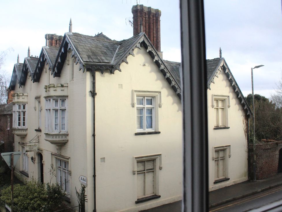 A view of a building from a window at 4BedHouse in Leominster