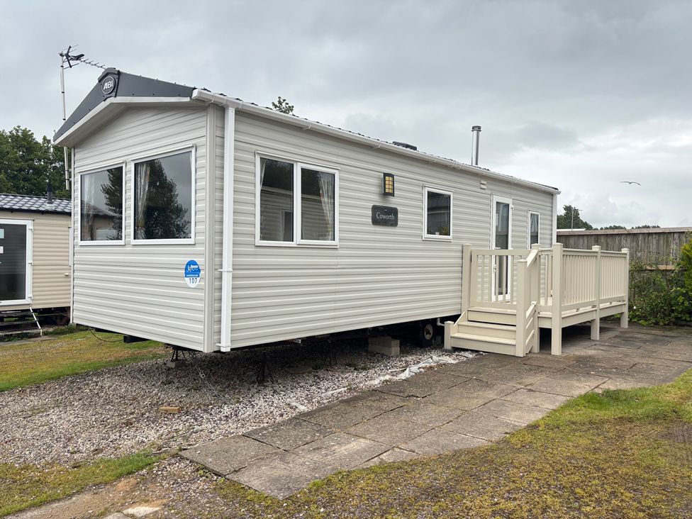 A caravan with decking and steps at Caravan Sleeps 5 - Decking, Parking, Pet Friendly in Blackpool