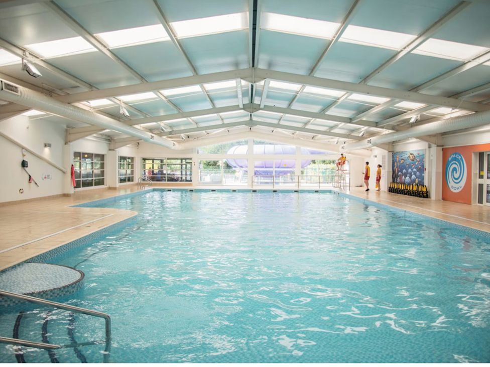 An indoor swimming pool with lifeguards at Caravan Sleeps 5 - Decking, Parking, Pet Friendly in Blackpool
