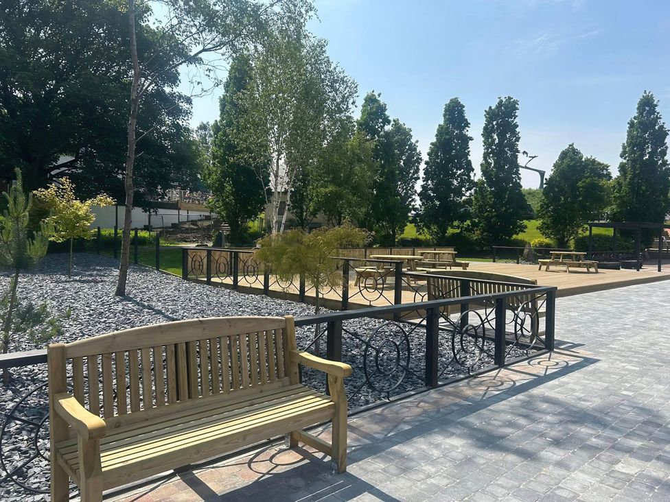 An outdoor area with benches and trees at Modern Apartment - Sleeps 4 - Centrally located Lanark