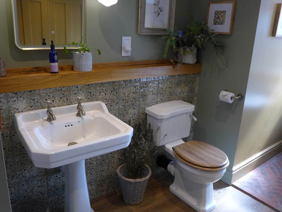 A bathroom with sink and toilet at Royal Oak Retreat Sleeps 6 Pub Pet Friendly Barcombe Cross