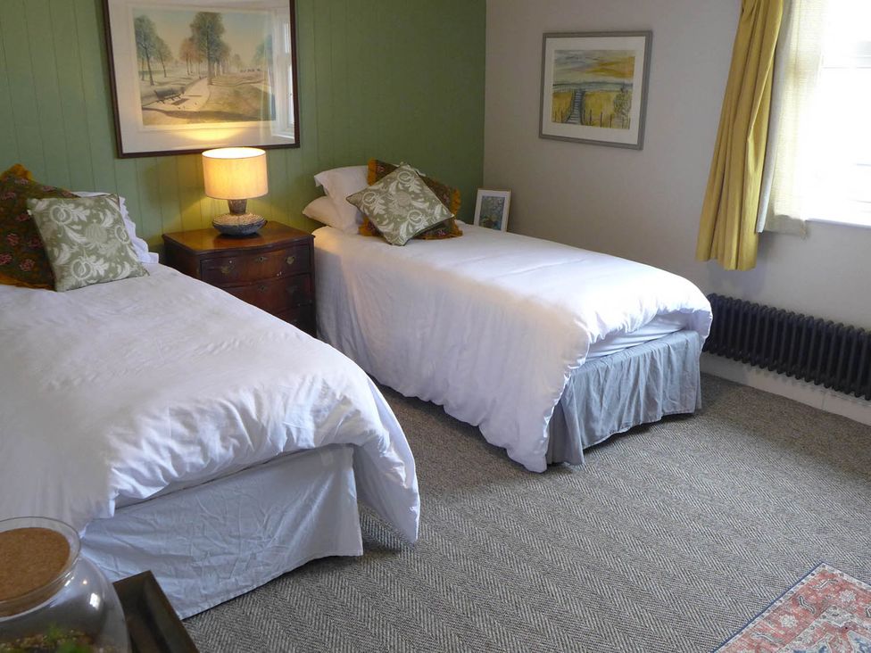 A bedroom with two beds and a lamp at Royal Oak Retreat Sleeps 6 Pub Pet Friendly in Barcombe Cross