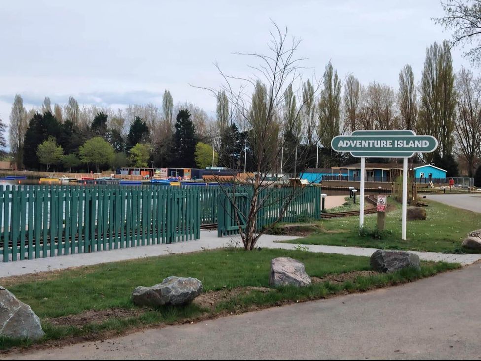 A park entrance with a sign at Adventure Island in Northampton