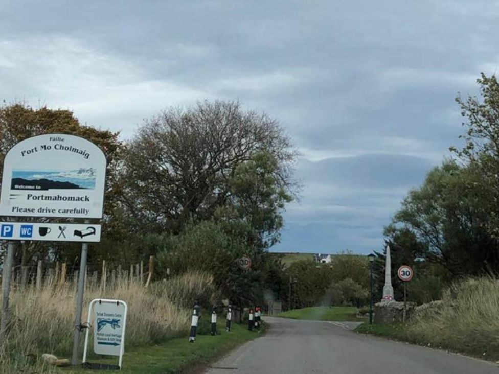 A welcome sign at the entrance to Portmahomack in Portmahomack