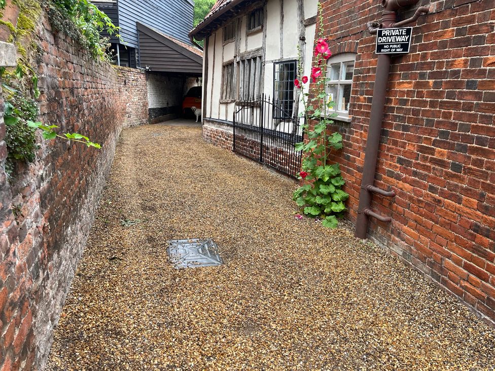 A private driveway with gravel surface at Historic Cottage on the Suffolk border, Harleston Norfolk